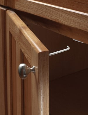 Protector de apertura para puertas y cajones